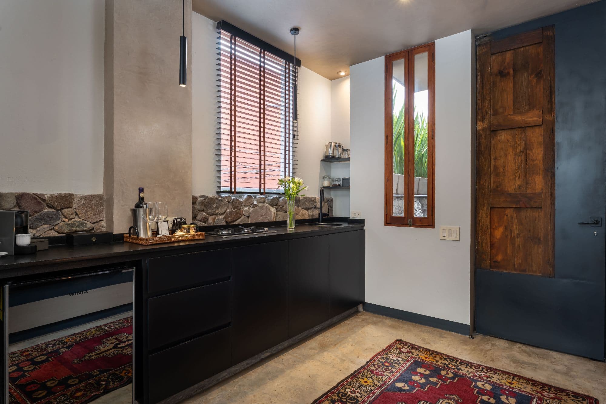 The Lofts — Centro, San Miguel de Allende — photo 13 — contemporary kitchen with rustic charm