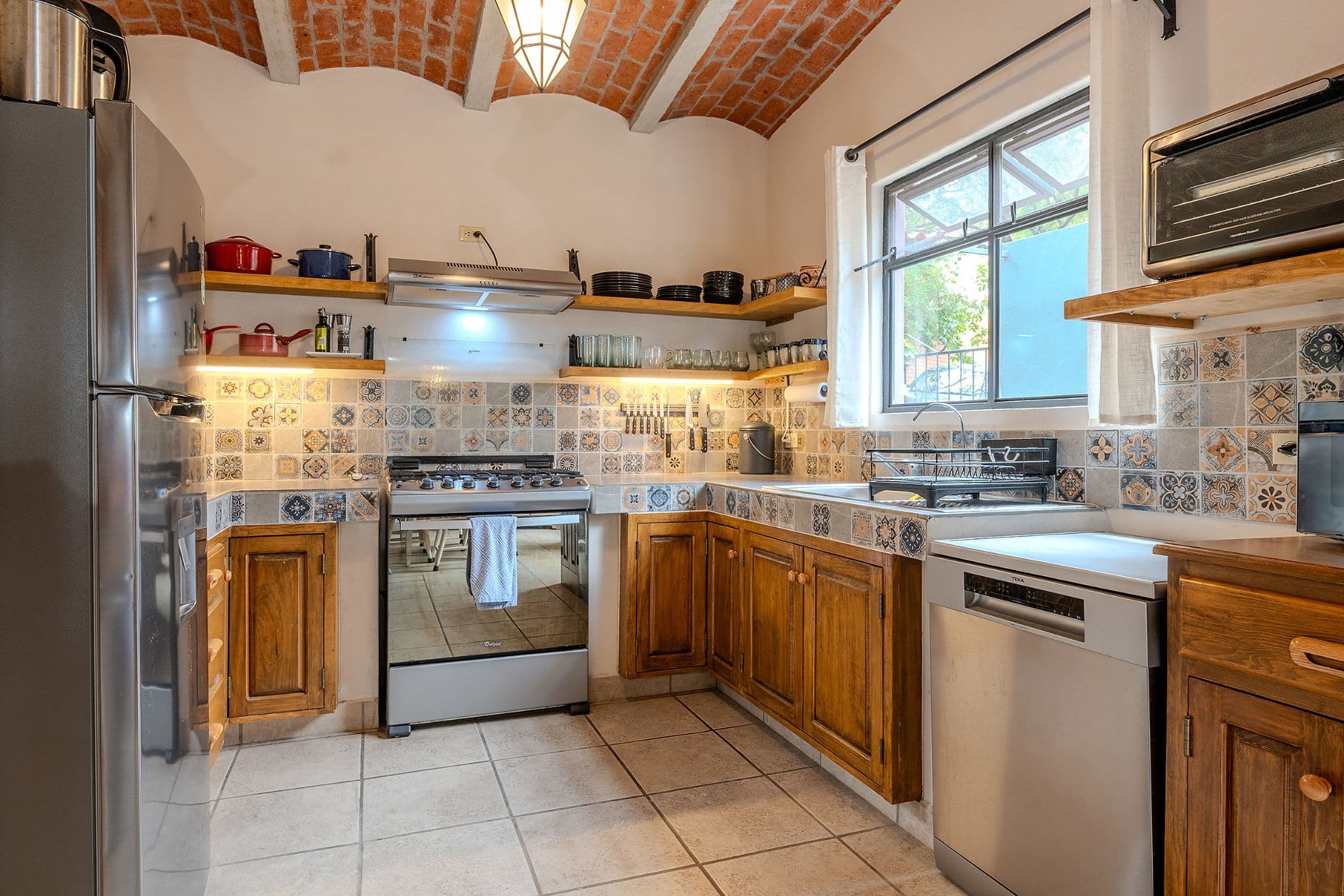 Casa Malva — Valle del Maíz, San Miguel de Allende — photo 7 — traditional artisan kitchen, abundant natural light