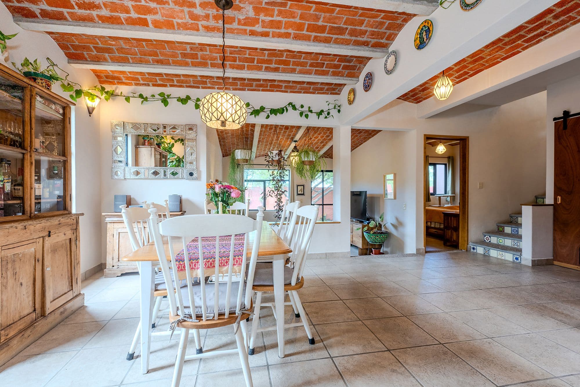 Casa Malva — Valle del Maíz, San Miguel de Allende — photo 9 — spacious open-concept living with rustic charm