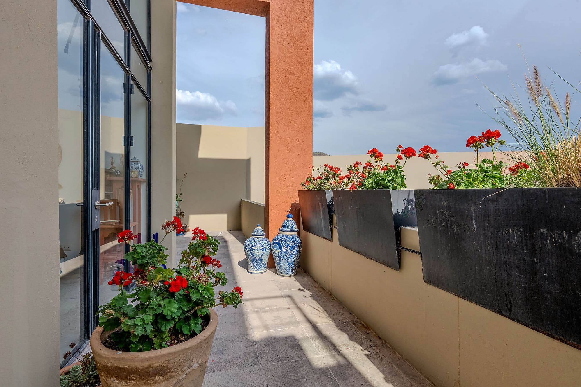 Casa Adrian — San Antonio, San Miguel de Allende — photo 15 — radiant rooftop terrace, charming geranium garden