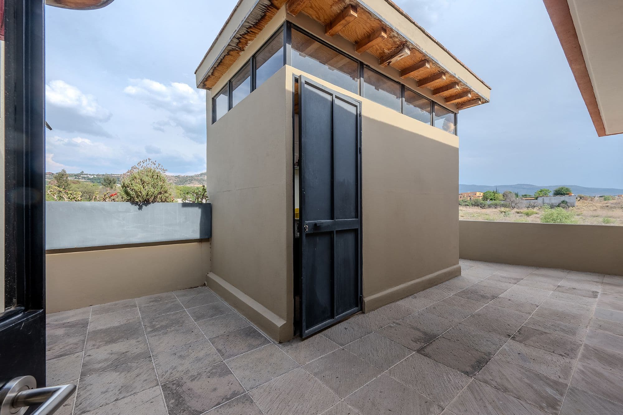 Casa Adrian — San Antonio, San Miguel de Allende — photo 22 — panoramic rooftop terrace with valley views