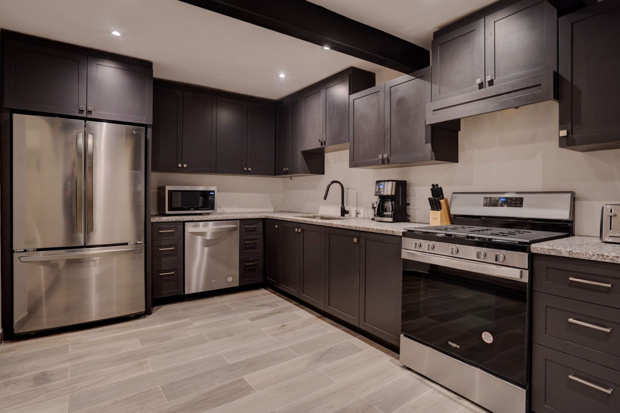 Casa Refugio Sur # 20A — San Antonio, San Miguel de Allende — photo 5 — contemporary chef's kitchen, gleaming stainless steel