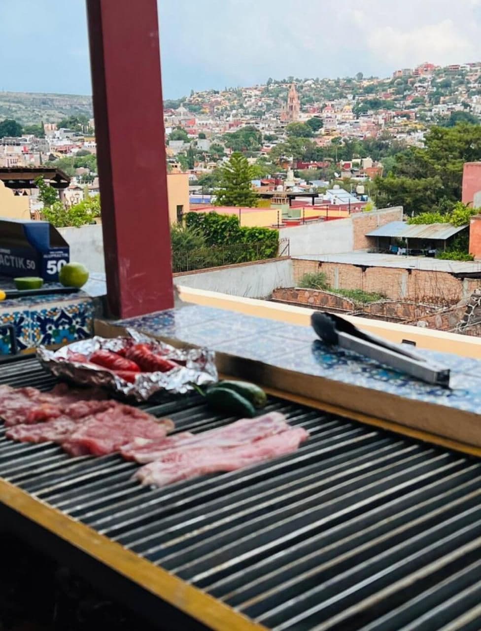 Casa Azul Orizaba — San Antonio, San Miguel de Allende — photo 16 — rooftop entertaining with panoramic city views