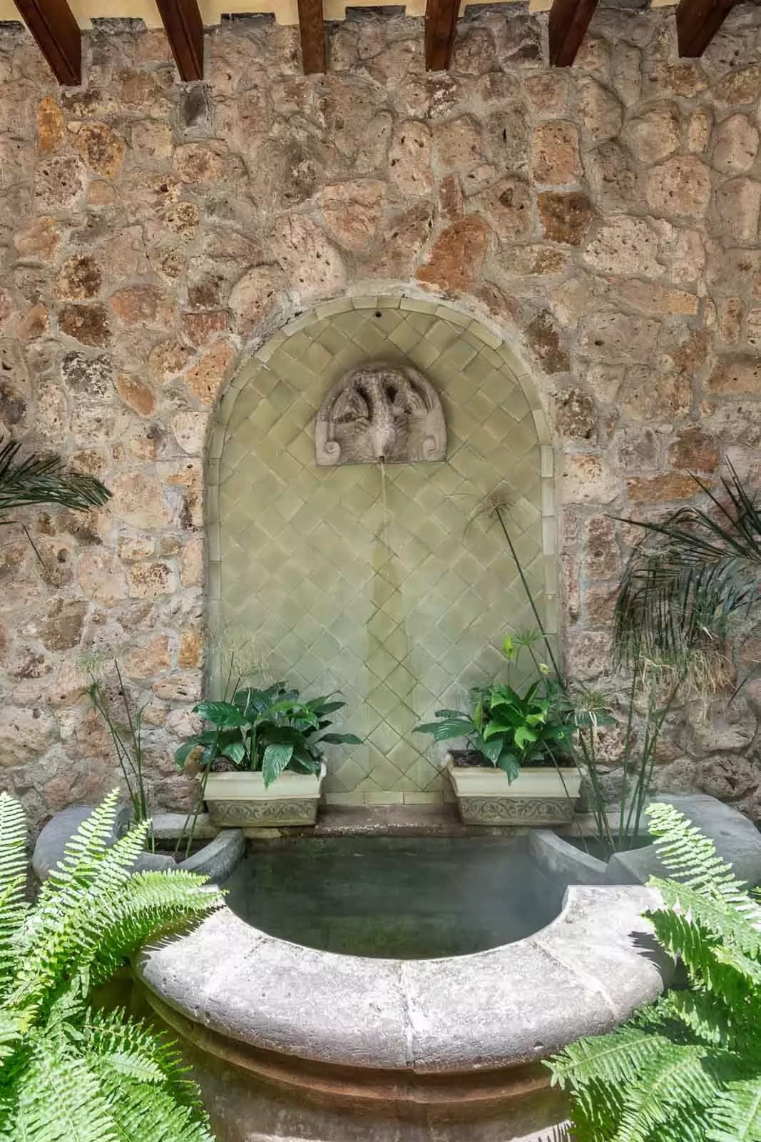 Casa la Perla — Ojo de Agua, San Miguel de Allende — photo 3 — enchanting courtyard fountain, architectural charm