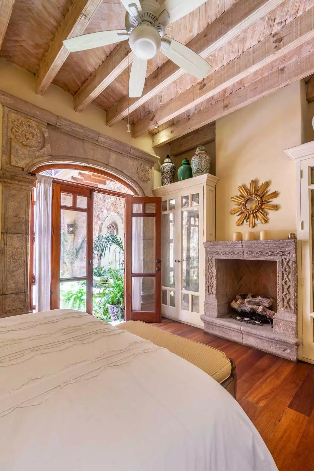 Casa la Perla — Ojo de Agua, San Miguel de Allende — photo 10 — serene master suite with fireplace charm