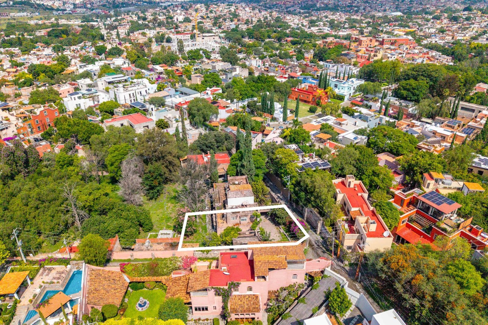 Lote Esquina — Guadiana, San Miguel de Allende — photo 4 — verdant hillside sanctuary, panoramic colonial vistas