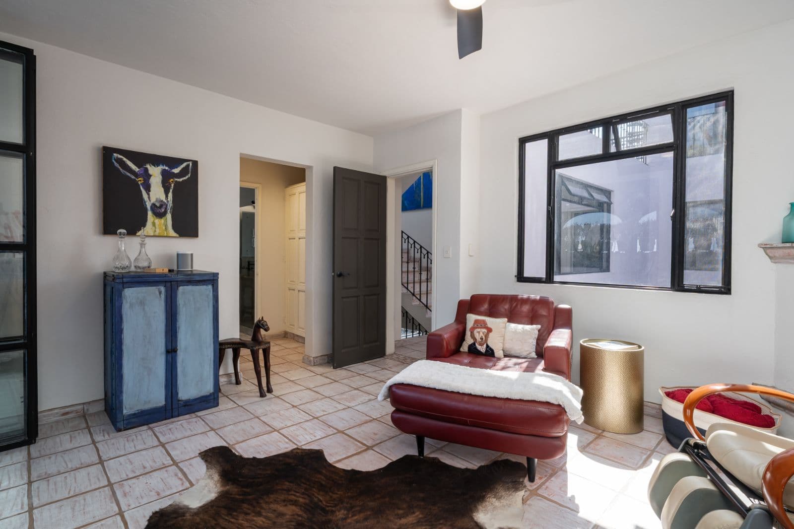 Casa Bruno — Guadalupe, San Miguel de Allende — photo 12 — sunlit living room, artful eclectic charm