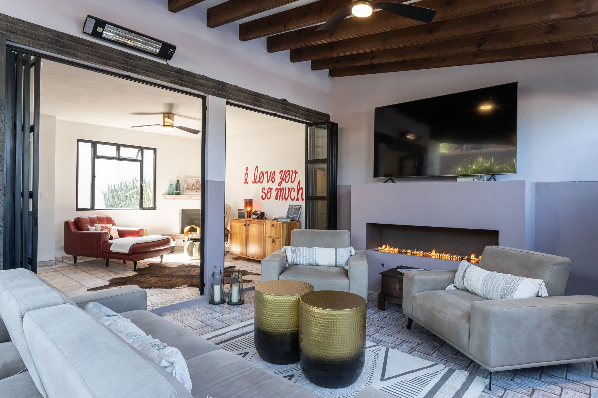 Casa Bruno — Guadalupe, San Miguel de Allende — photo 24 — sophisticated open-concept living, fireplace warmth