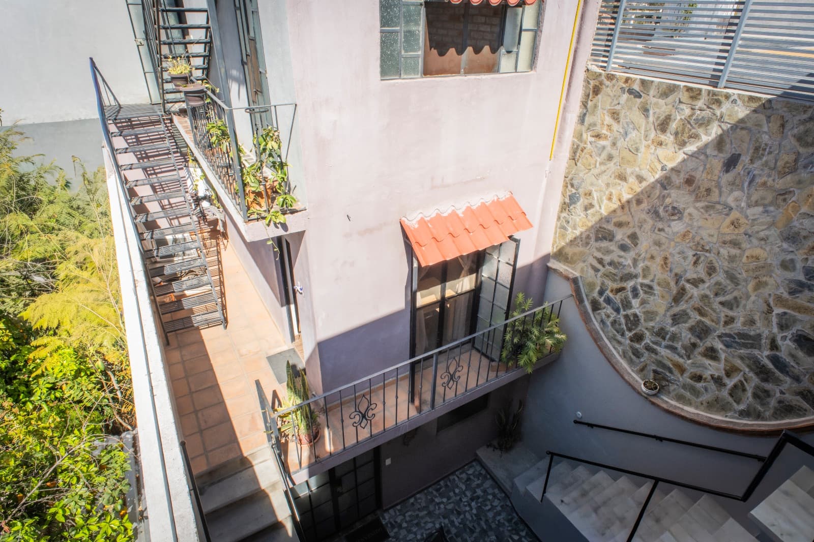 The Nest — San Antonio, San Miguel de Allende — photo 19 — charming courtyard with rustic stone character