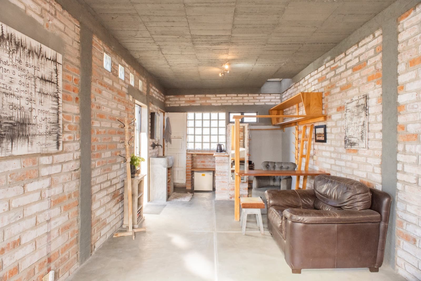 The Nest — San Antonio, San Miguel de Allende — photo 15 — rustic brick loft, soaring ceilings