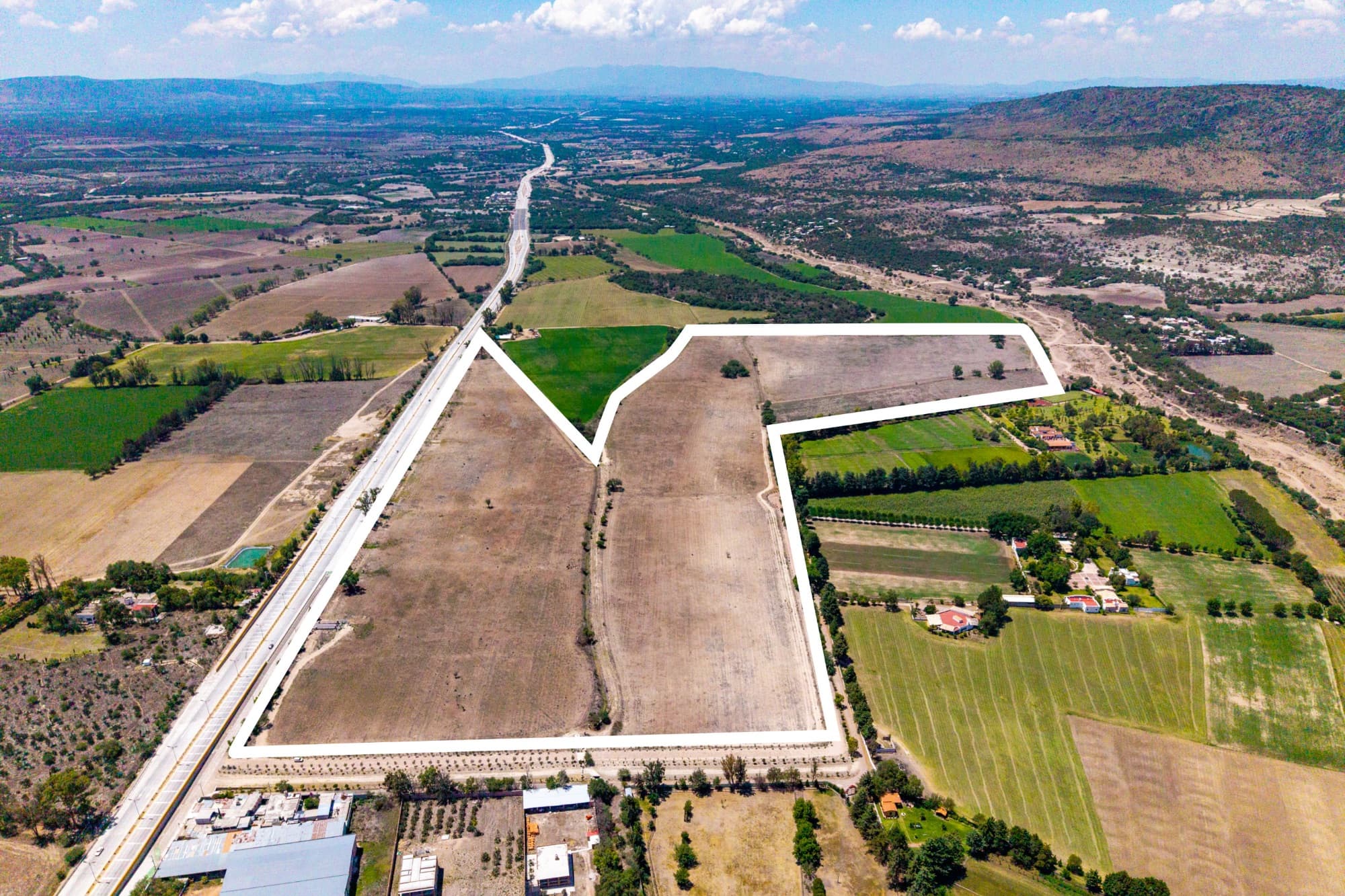 Macro lote Rancho Alegre — Centro, San Miguel de Allende — photo 3 — expansive agricultural land, panoramic valley vistas