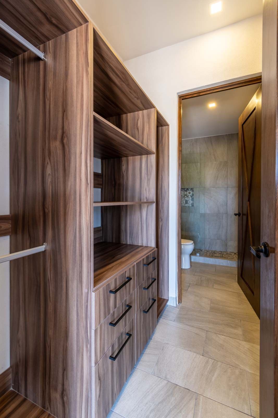 La Estación Studio — Centro, San Miguel de Allende — photo 7 — sophisticated walk-in closet with luxury finishes