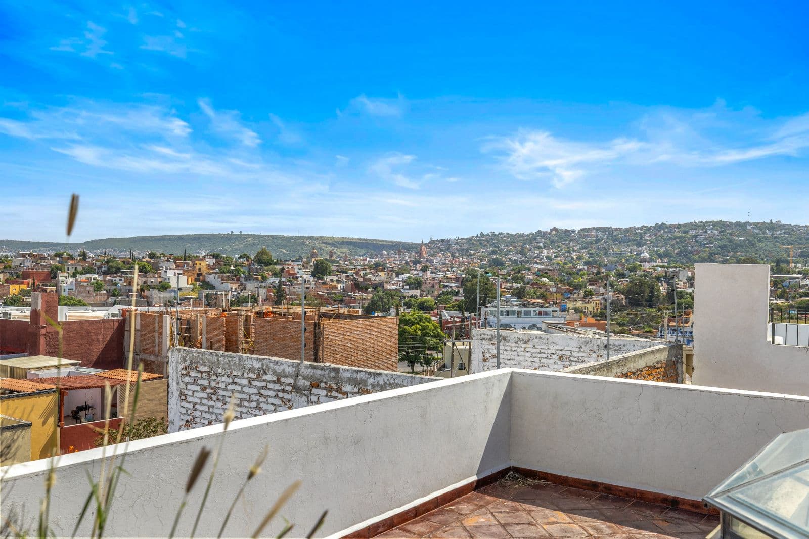 Casa Gorrion — Las Brisas, San Miguel de Allende — photo 20 — panoramic cityscape from sun-drenched rooftop terrace