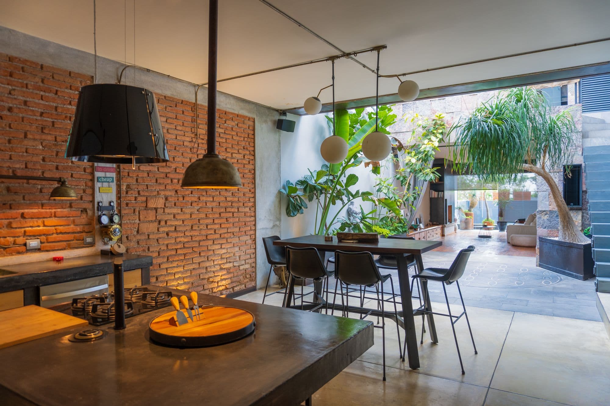 CASA FORJA — Centro, San Miguel de Allende — photo 3 — sophisticated industrial loft, verdant courtyard oasis