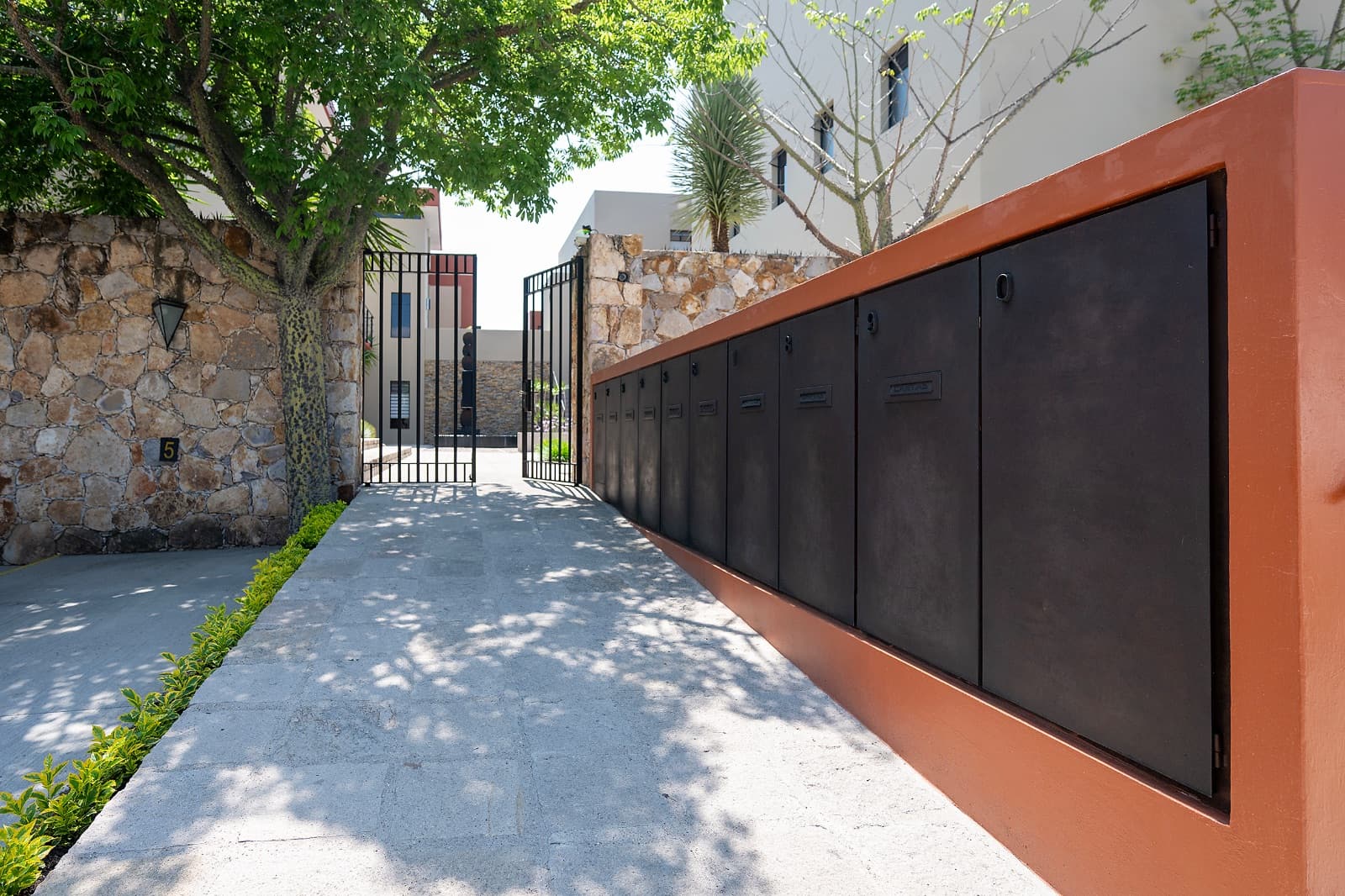 Modern Ground-Level Condo Near Centro — San Antonio, San Miguel de Allende — photo 24 — sophisticated gated courtyard entry