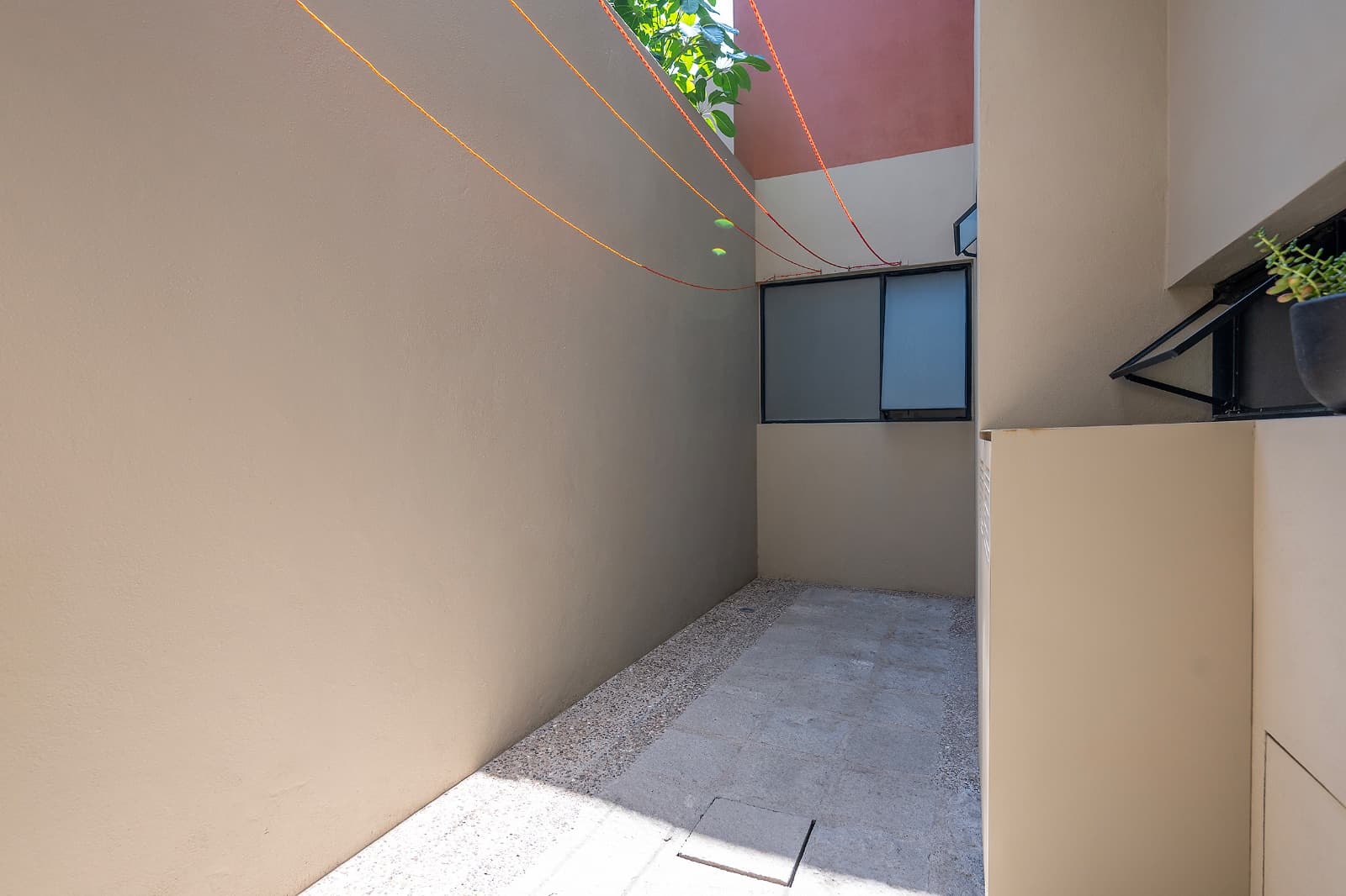 Modern Ground-Level Condo Near Centro — San Antonio, San Miguel de Allende — photo 21 — bright courtyard with authentic architectural charm