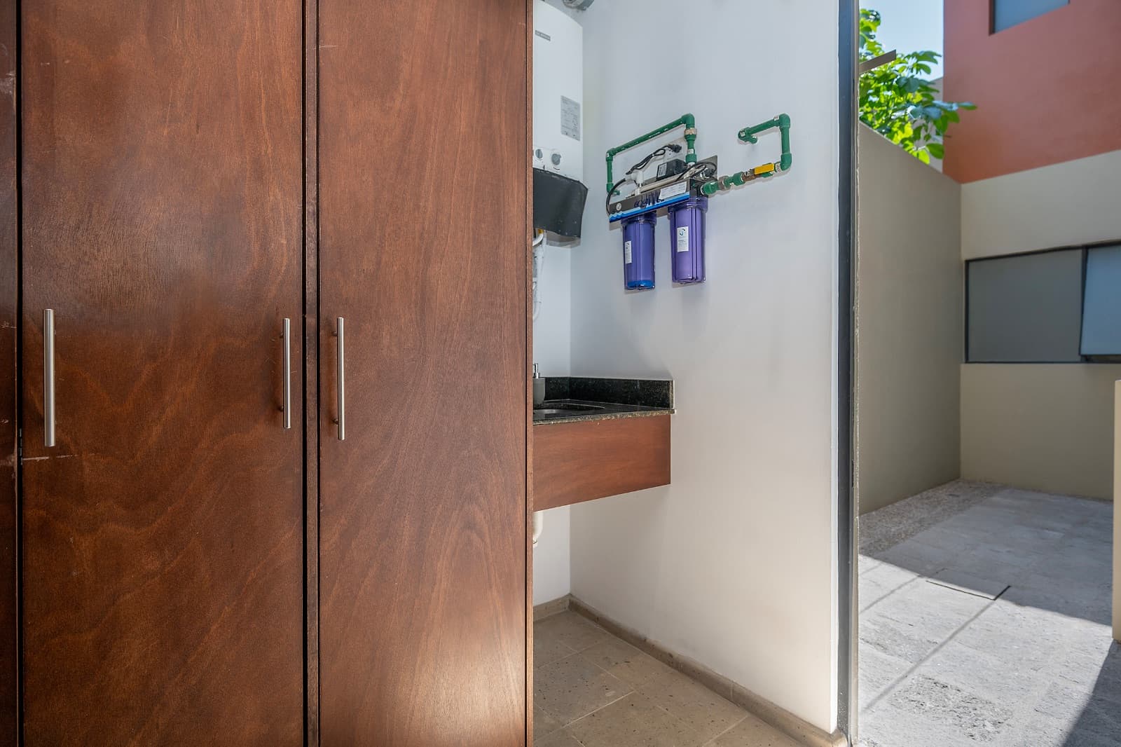 Modern Ground-Level Condo Near Centro — San Antonio, San Miguel de Allende — photo 20 — modern utility area with refined finishes