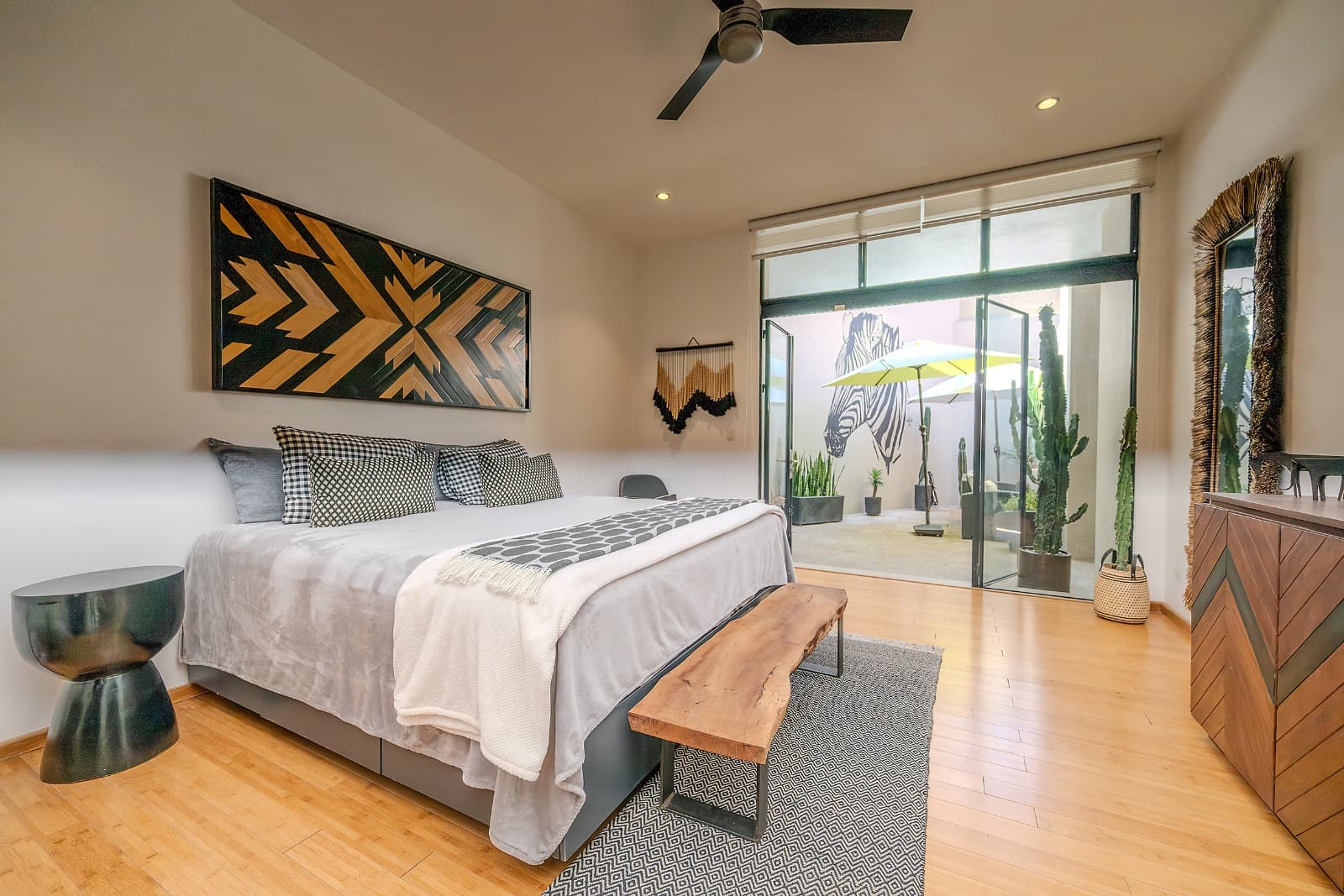 Modern Ground-Level Condo Near Centro — San Antonio, San Miguel de Allende — photo 4 — serene master suite, garden views, architectural elegance
