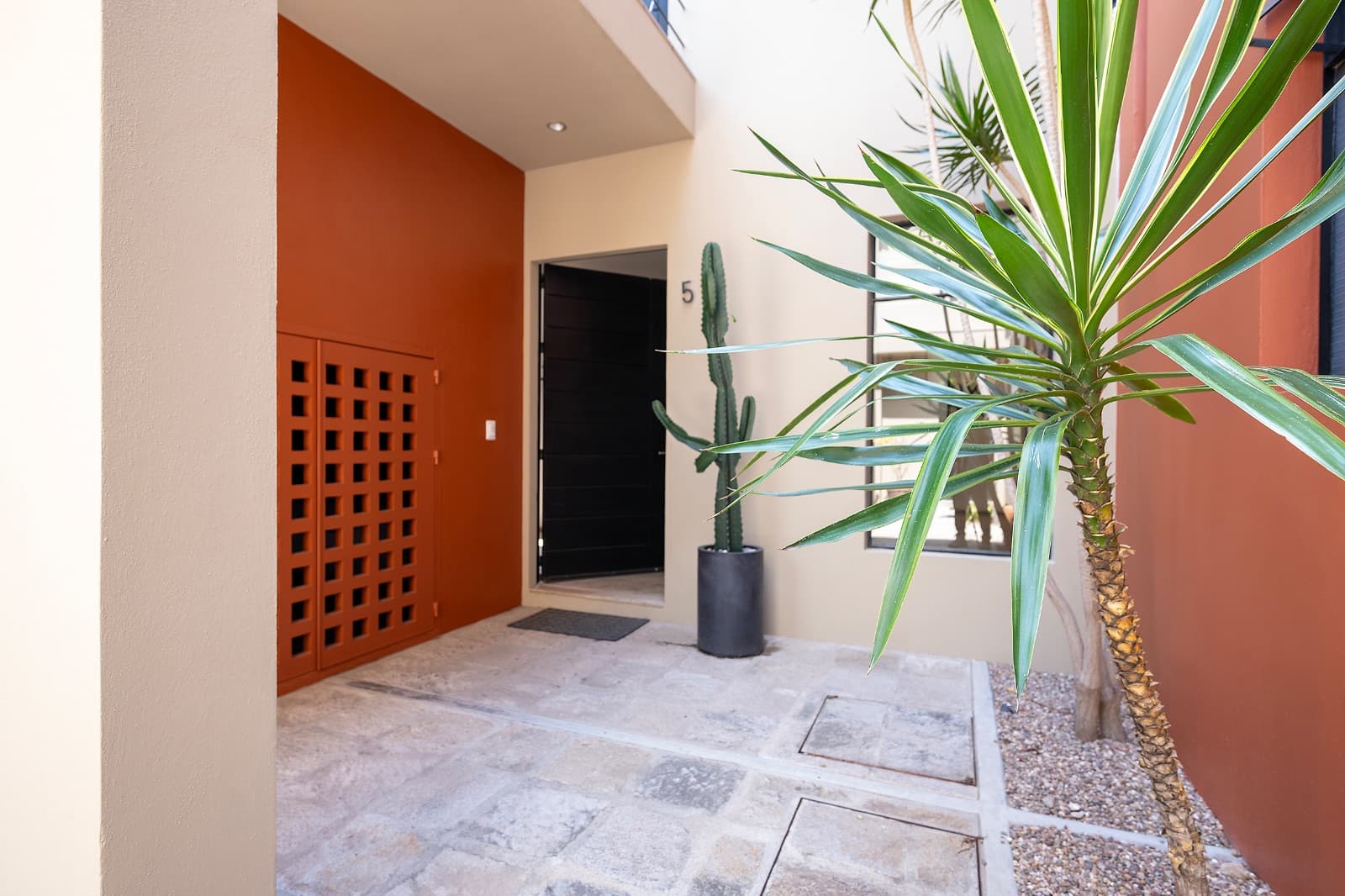 Modern Ground-Level Condo Near Centro — San Antonio, San Miguel de Allende — photo 23 — modern courtyard with stunning architectural details