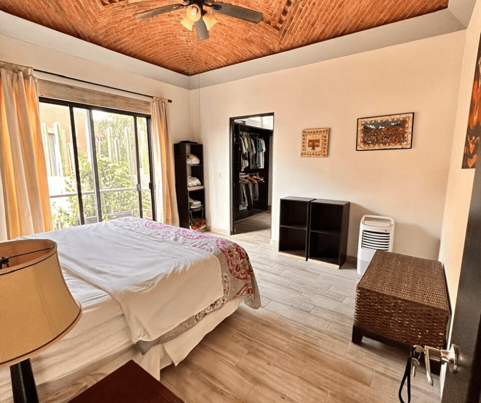 Villa San Gamaliel — El Paraiso, San Miguel de Allende — photo 15 — serene primary suite with garden views