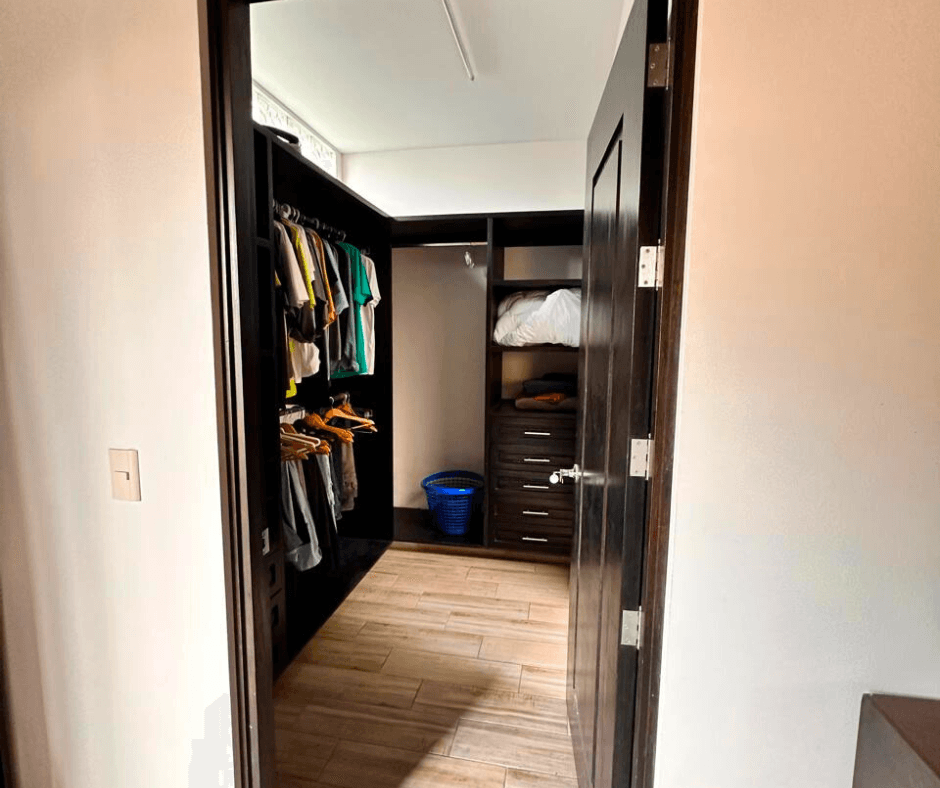 Villa San Gamaliel — El Paraiso, San Miguel de Allende — photo 18 — spacious walk-in closet, elegant dark cabinetry