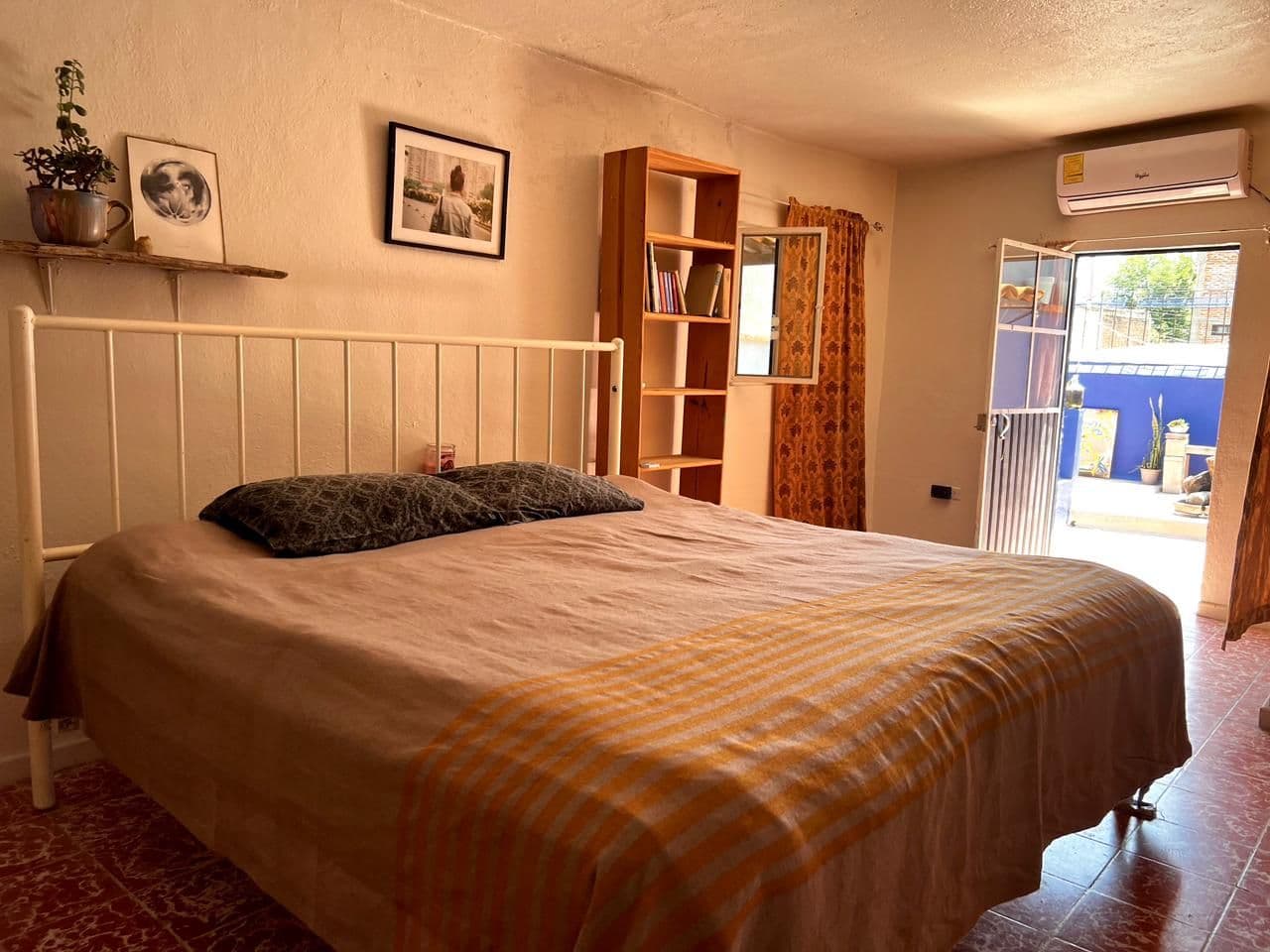 PROPIEDAD PARA REMODELAR CON GRAN POTENCIAL EN SAN ANTONIO — San Antonio, San Miguel de Allende — photo 10 — serene master suite with terrace views