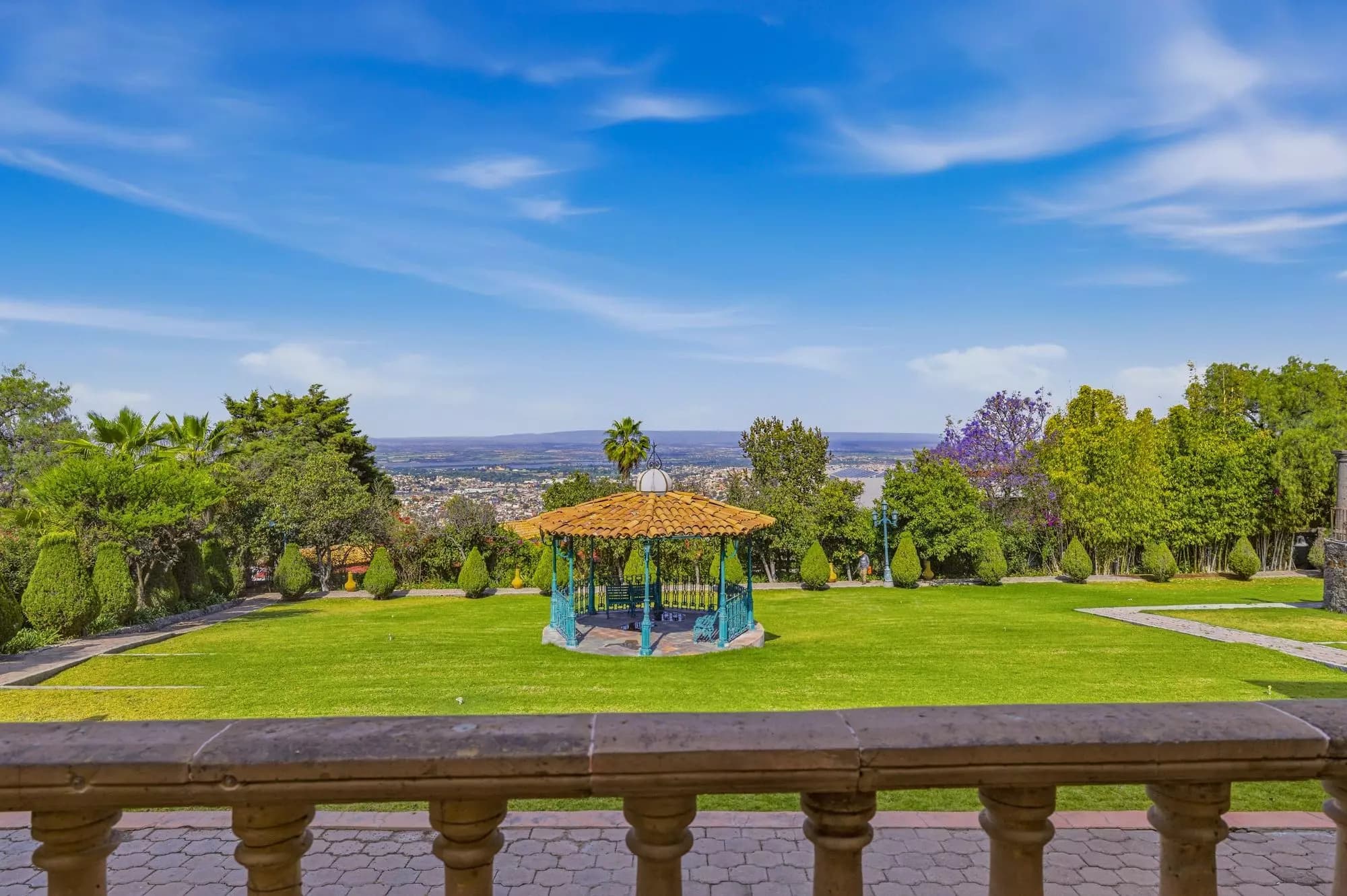 Hotel Mirador del Frayle — La Palmita, San Miguel de Allende — photo 10 — manicured gardens commanding panoramic valley vistas