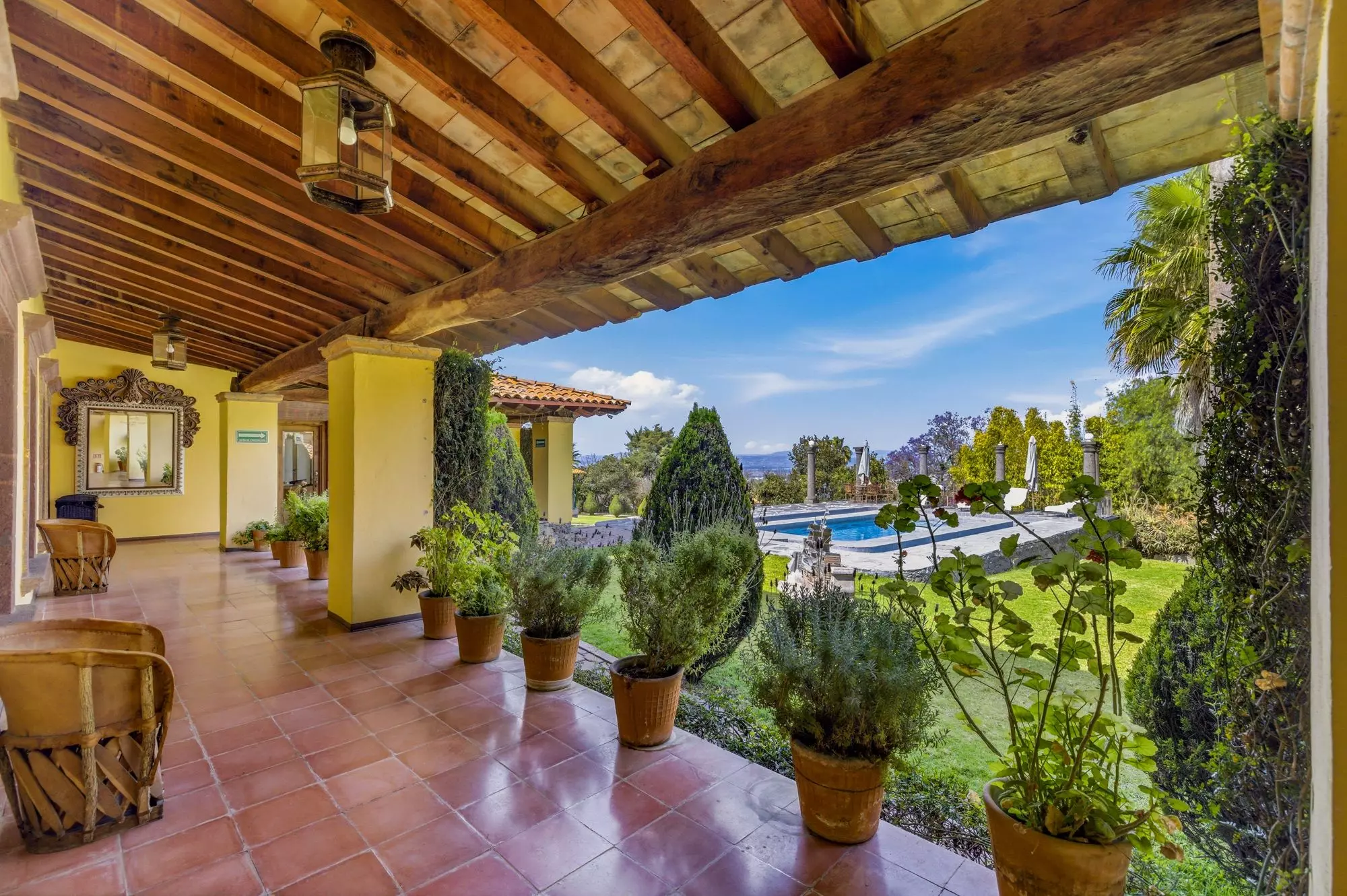 Hotel Mirador del Frayle — La Palmita, San Miguel de Allende — photo 13 — rustic elegance meets manicured luxury gardens