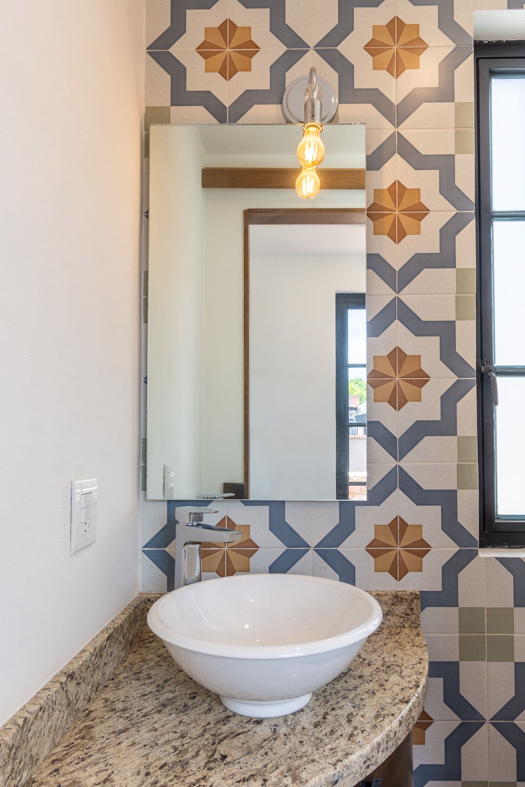 CASA PACO — San Antonio, San Miguel de Allende — photo 20 — artisan-tiled powder room with elegant vessel sink