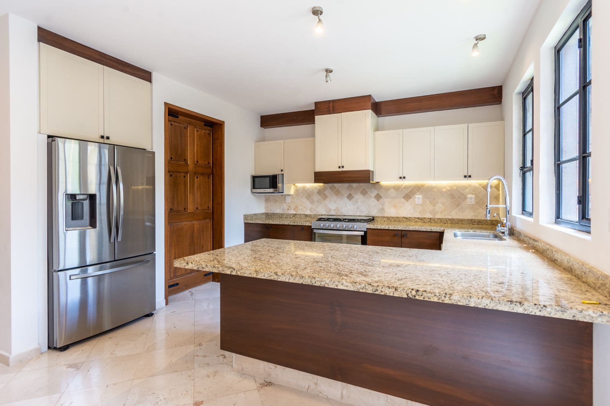 CASA PACO — San Antonio, San Miguel de Allende — photo 9 — sophisticated chef's kitchen, timeless elegance