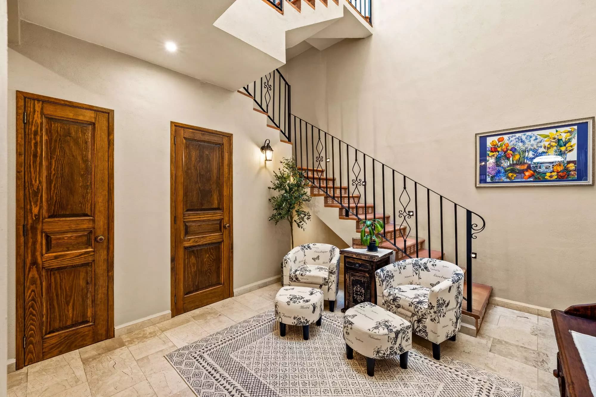 Casa Del Farolito — Guadalupe, San Miguel de Allende — photo 6 — elegant foyer with soaring ceilings, architectural staircase