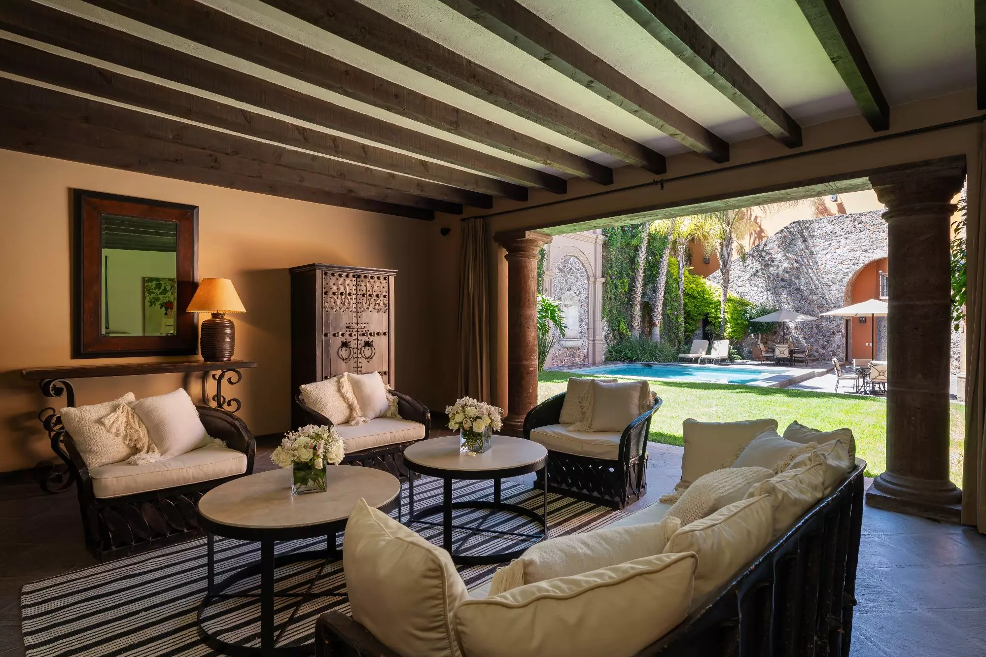 Casa Encantada — Centro, San Miguel de Allende — photo 19 — elegant courtyard lounge, poolside living