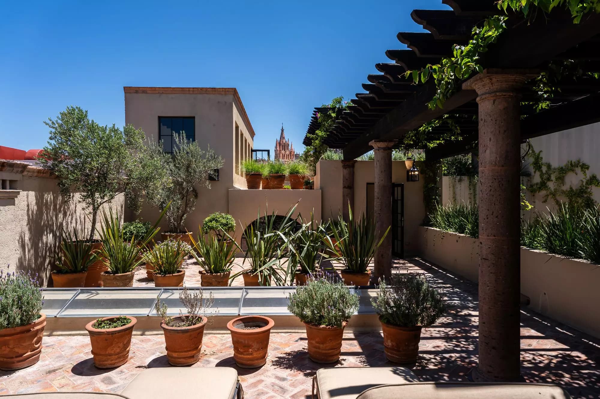 Casa Encantada — Centro, San Miguel de Allende — photo 22 — charming courtyard with cathedral views