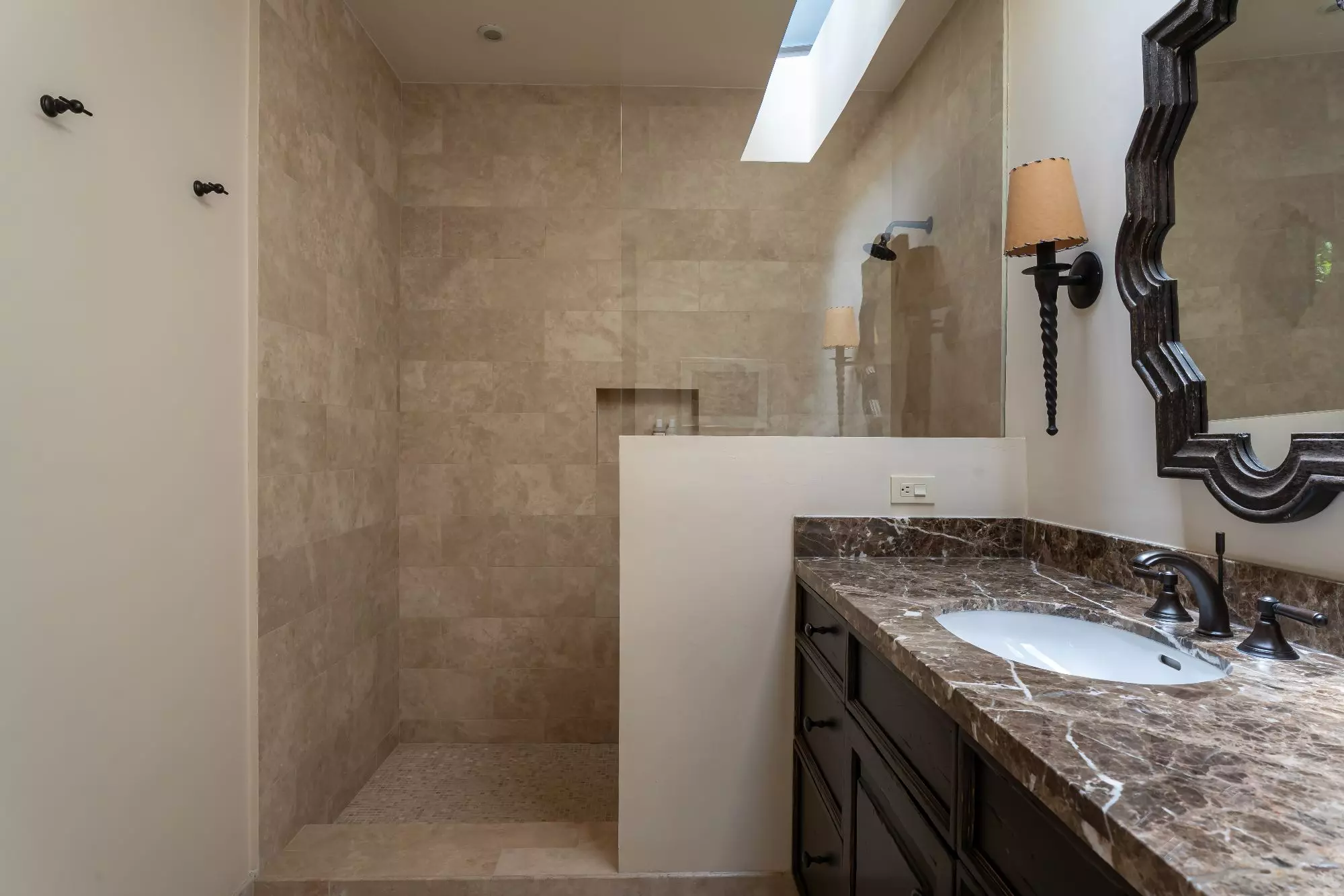 Casa Encantada — Centro, San Miguel de Allende — photo 9 — spa-like master bath with skylight