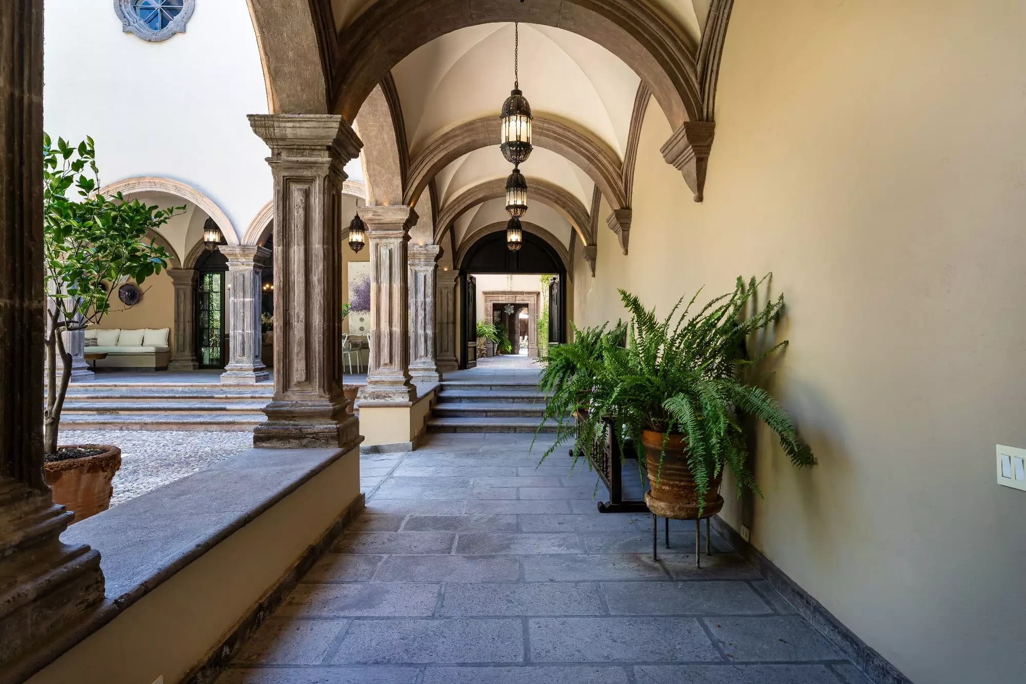 Casa Encantada — Centro, San Miguel de Allende — photo 6 — elegant arched corridor with timeless charm