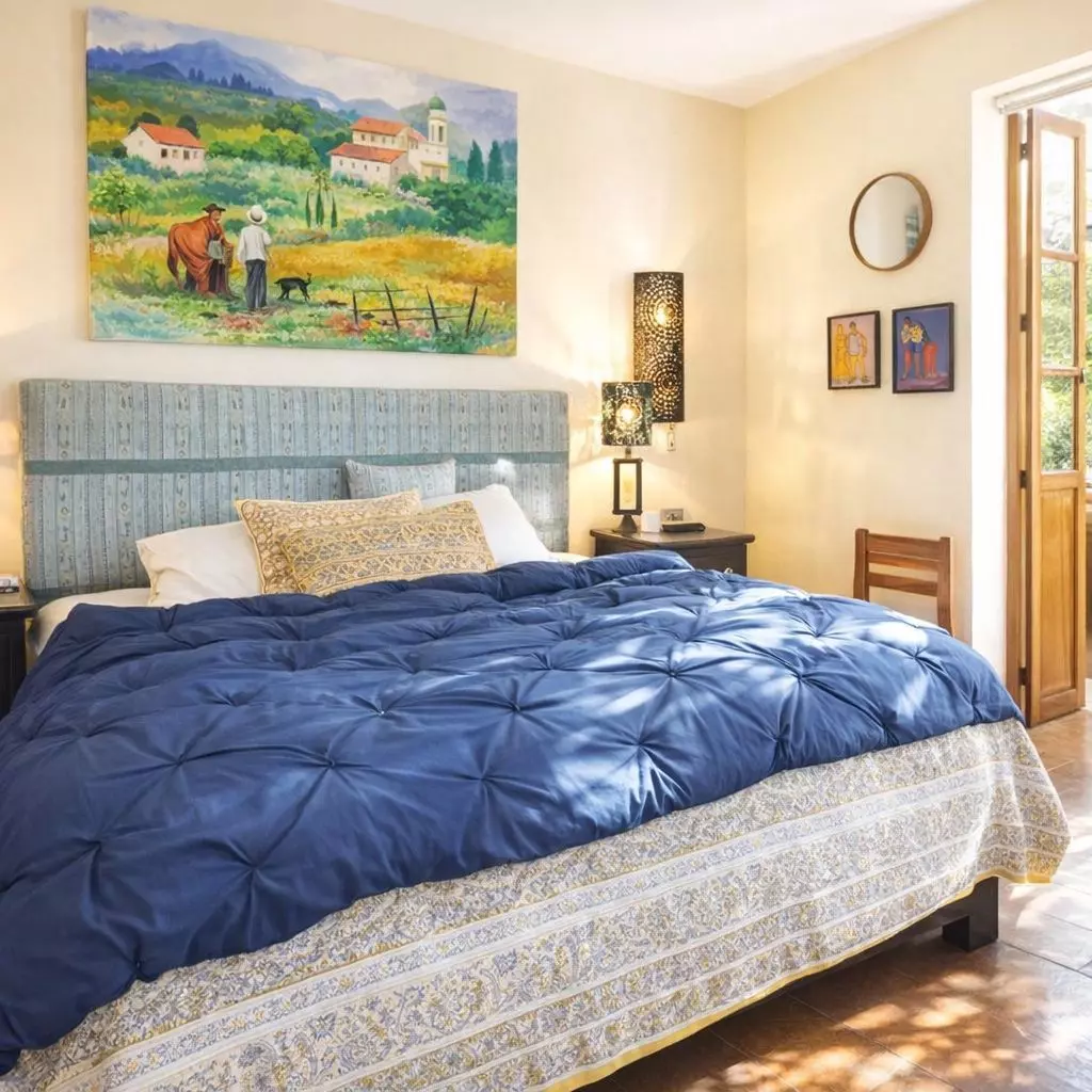 Casa Vergel — San Antonio, San Miguel de Allende — photo 21 — sunlit bedroom with rustic charm