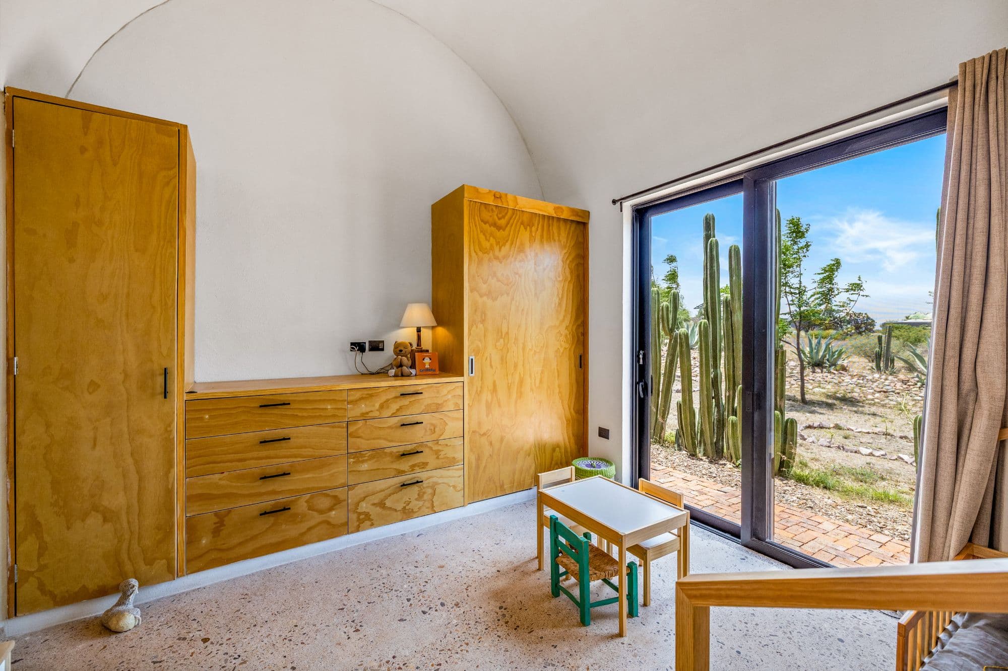 Villa Jacaranda - Architectural Country Living Near San Miguel — Capadero (San Isidro Capadero), San Miguel de Allende — photo 18 — serene barrel-vault bedroom with desert views