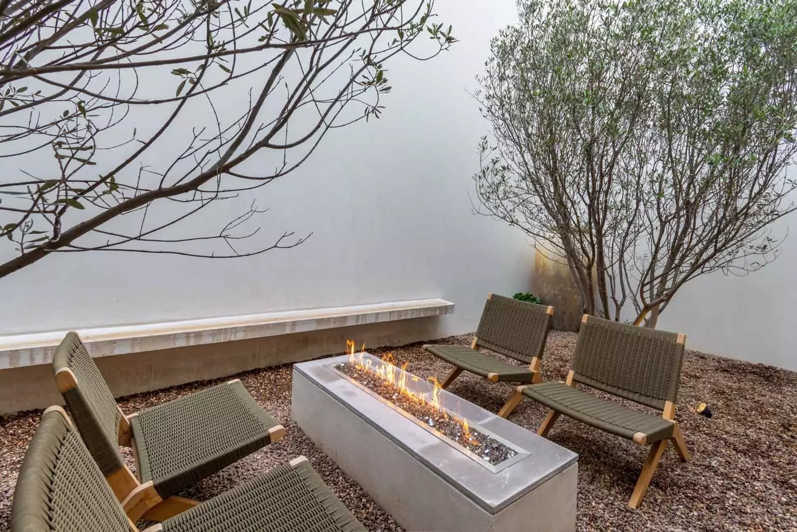 Indigo 8 — Guadiana, San Miguel de Allende — photo 6 — serene lakeside fireplace gathering space