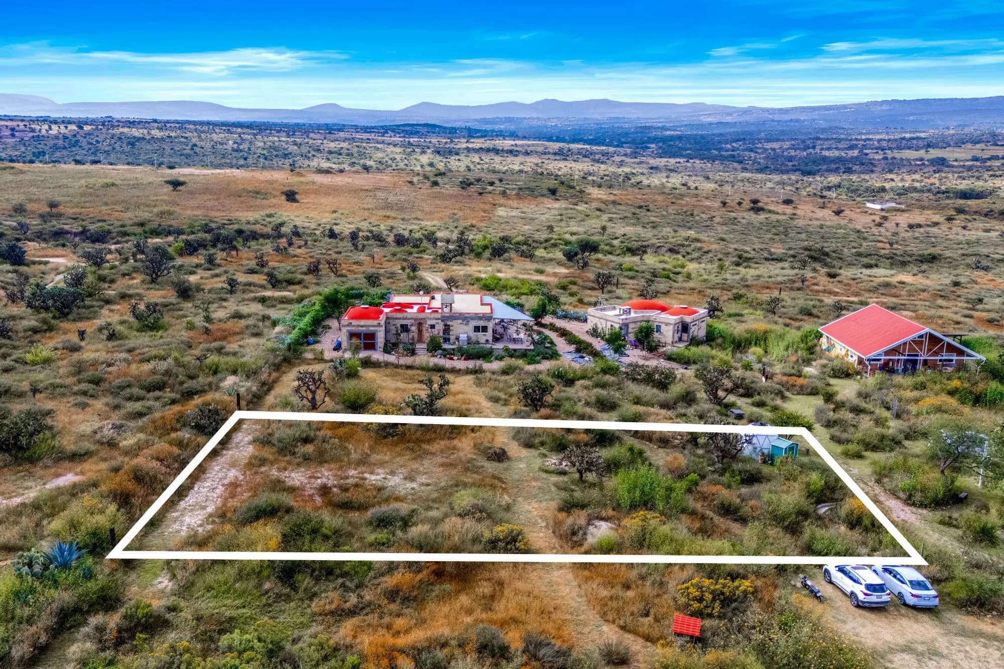 Hapori Eco Aldea Lot 2 — Capadero (San Isidro Capadero), San Miguel de Allende — photo 3 — expansive hilltop vista with development potential