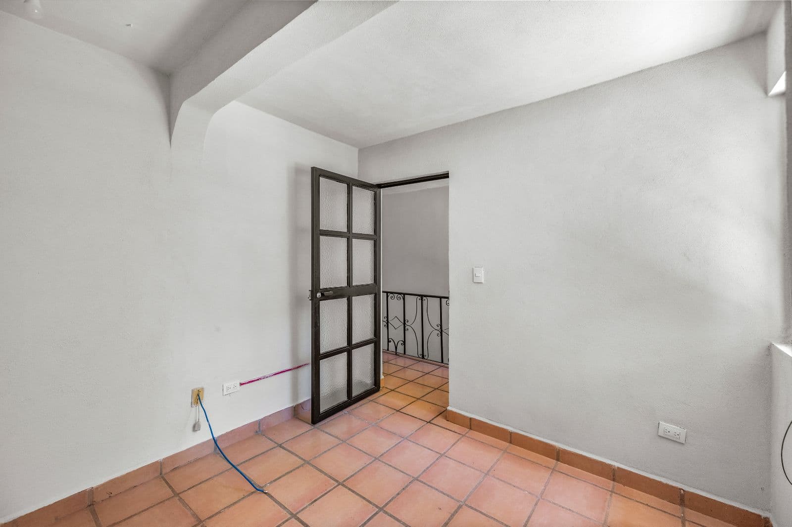 Great Renovation Project — San Antonio, San Miguel de Allende — photo 13 — bright corner room, charming wrought-iron doors