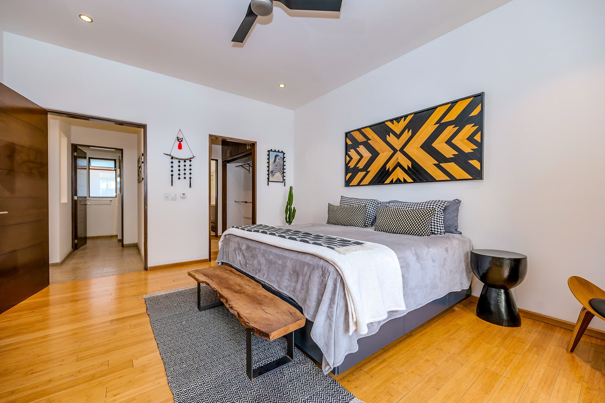 Ground Level Condo — San Antonio, San Miguel de Allende — photo 13 — contemporary master suite, geometric art accent